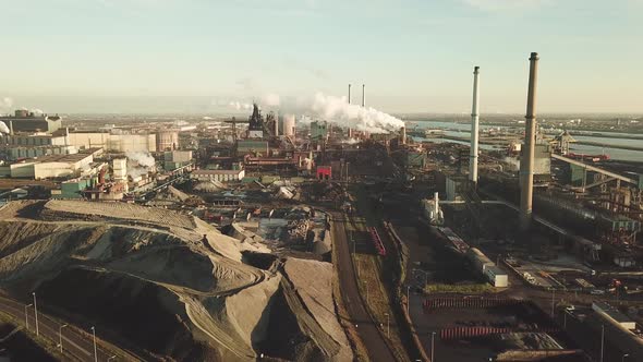 Aerial view of factory Tata Steel with smoking chimneys in Holland