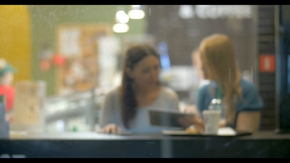 They Have Nice Time In Cafe While It's Raining alt