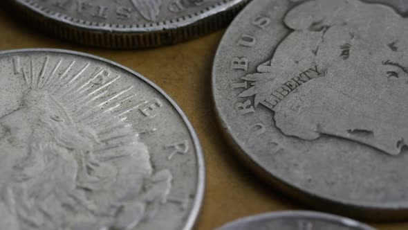 Rotating stock footage shot of antique American coins 