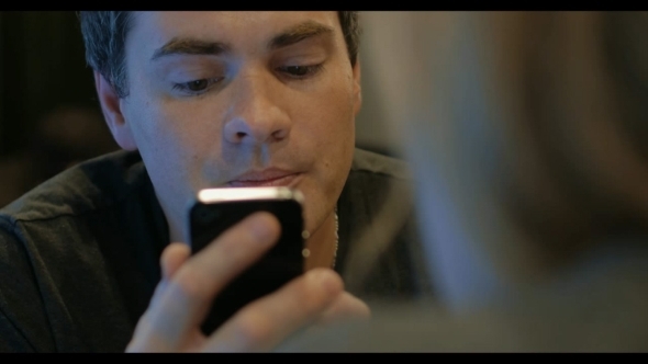 Man Using Cell And Talking To Woman alt