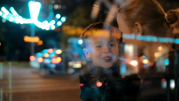Happy Mother And Child Talking In Night City alt