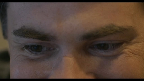 Young Smiling Man Having a Video Call On Cell alt