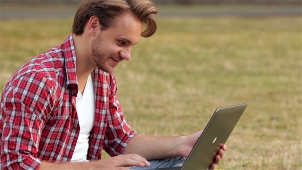 Smart Guy Studing Outdoors alt