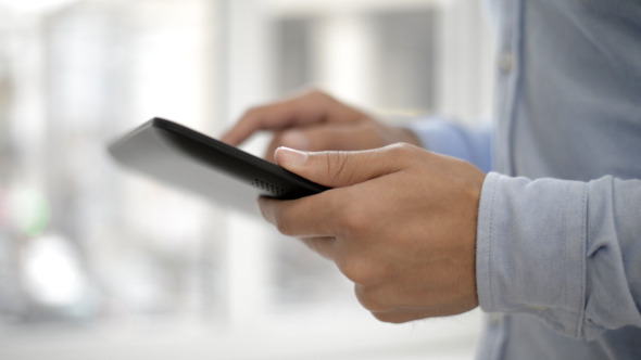 Hands Using Tablet  alt