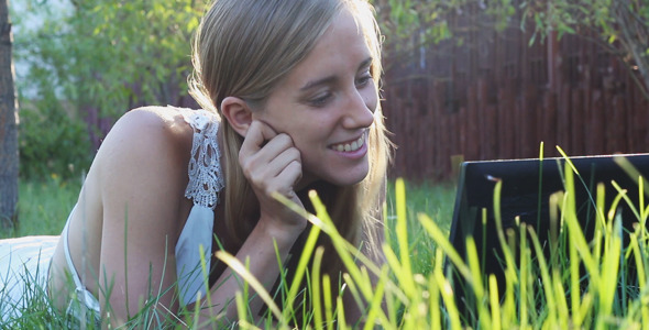Girl Talking on Skype in the Park alt