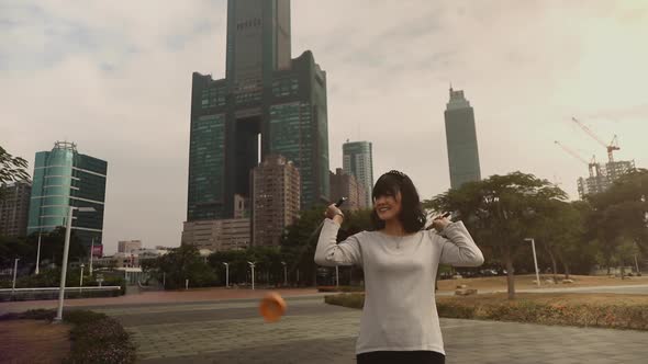 Taiwanese woman playing with a Chinese Yo-Yo