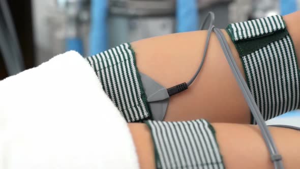 Beautiful Woman getting Electrostimulation Therapy