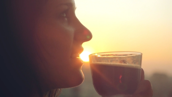 Beautiful Girl Drinking Coffee