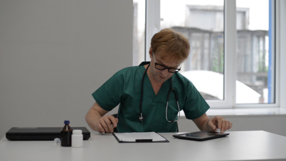 Doctor Working , Using Tablet