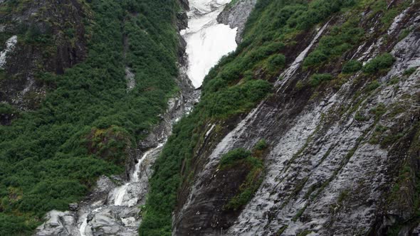 Upwards pan of ice in small canyon