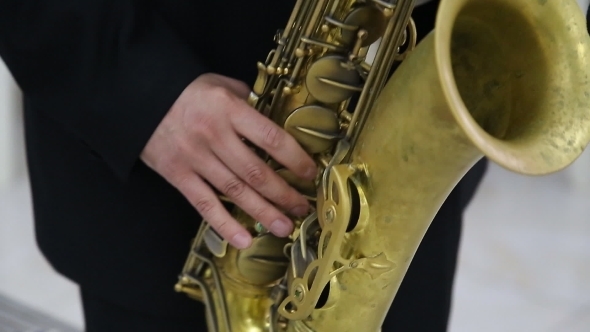 Man Playing Saxophone alt