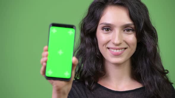Young Beautiful Woman Showing Phone
