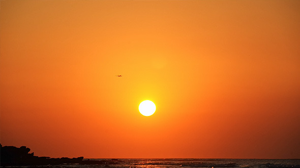 Sunset and Landing Plane