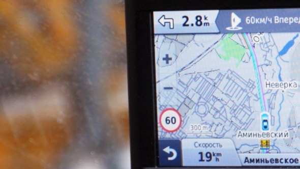 GPS In Car Showing Way, Speed And Distance