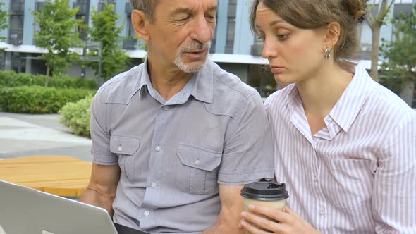 Older Coworker Teaches Young Woman Provides Employee Feedback Coorporate Intership Education