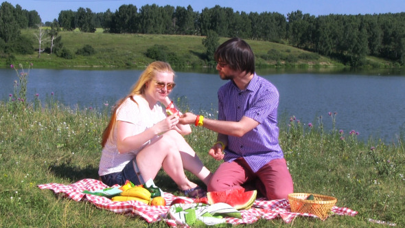Happy Couple Have Picnic Outdoor