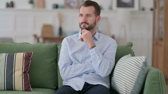 Worried Young Man Thinking About Problems