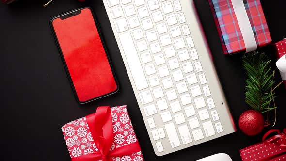 Computer Keyboard, Modern Smartphone, Mouse and Christmas Boxed Gifts