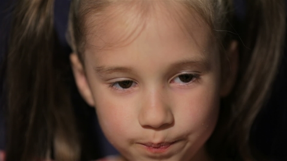 Beautiful Little Girl Waching Movie In The Cinema alt