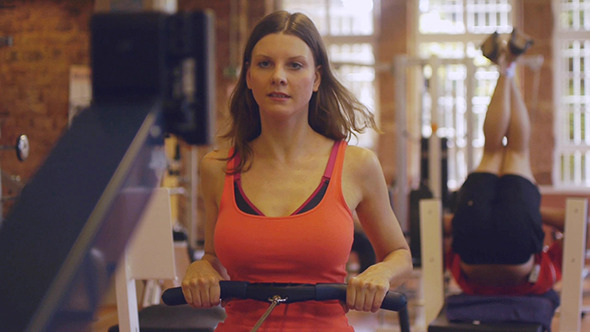 Girl Build Her Body At The Gym