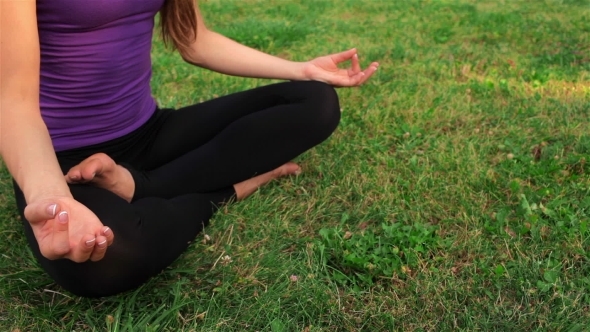 Young Girl Doing Yoga In The Park alt