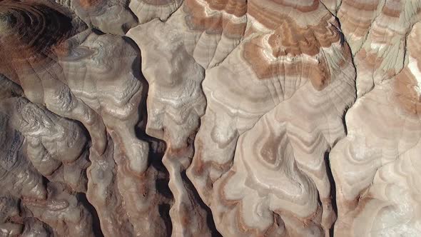 Aerial view above landscape that looks like Mars