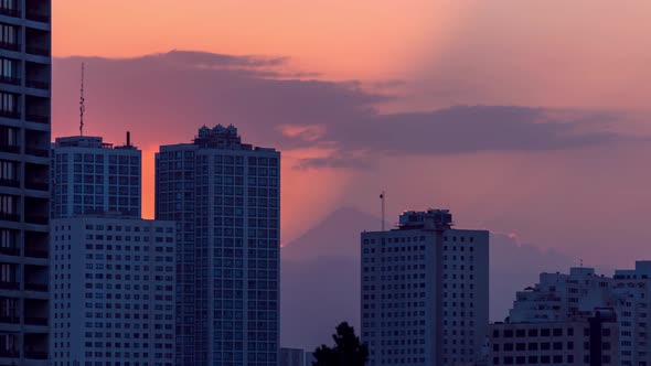 Breathtaking Sunrise Behind the Damavand Alone Volcano Mountain Peak in Tehran Iran with Shadow of S