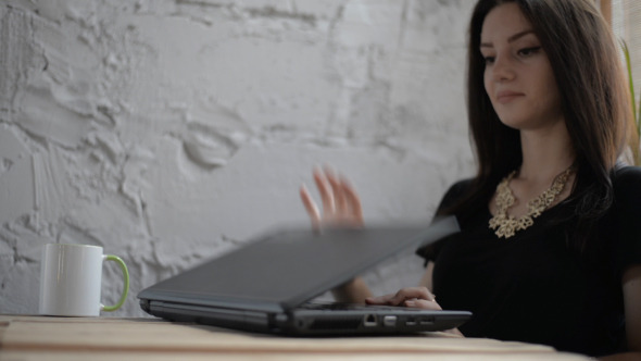 Girl Opens  Laptop and Starts Using  alt