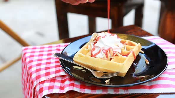 Put Strawberry Syrup On Wafer Whip Cream