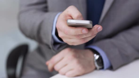 Close Up Of Businessman Calling On Smartphone