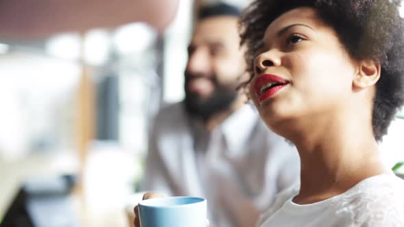 Happy Creative Team Drinking Coffee In Office 24 alt