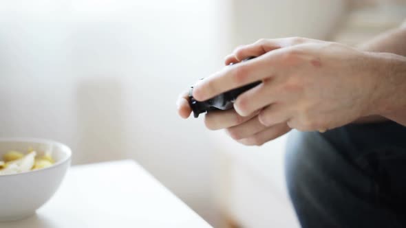 Close Up Of Man Hands Playing Video Game At Home 1