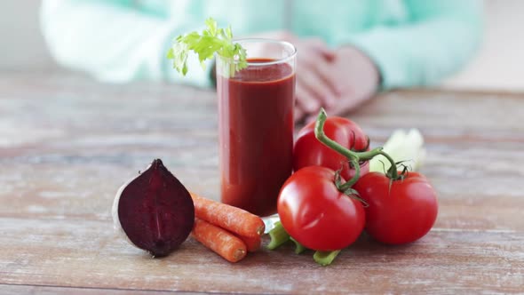 Close Up Of Woman Hands With Juice And Vegetables 3