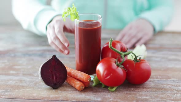 Close Up Of Woman Hands With Juice And Vegetables 4