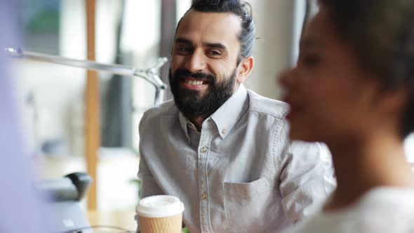 Happy Creative Team Drinking Coffee In Office 27 alt