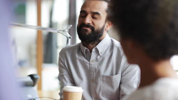 Happy Creative Team Drinking Coffee In Office 28