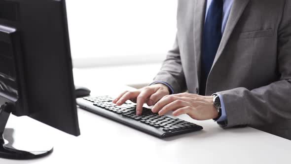 Close Up Of Businessman Hands Typing On Keyboard 1
