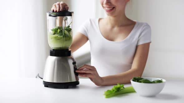 Smiling Woman With Blender And Green Vegetables 4