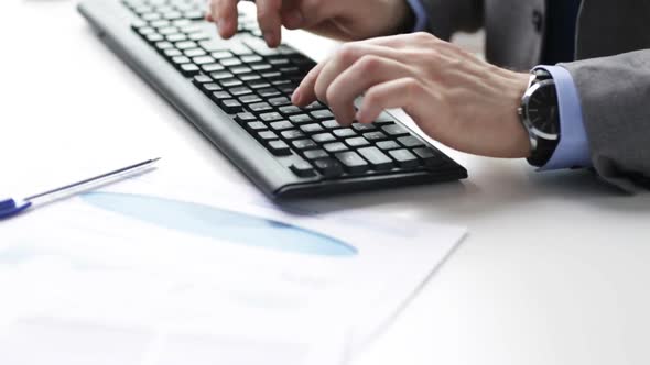 Close Up Of Businessman Hands Typing On Keyboard 14 alt