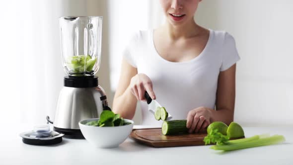 Smiling Woman With Blender Chopping Vegetables 1