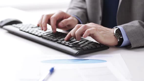 Close Up Of Businessman Hands Typing On Keyboard 15
