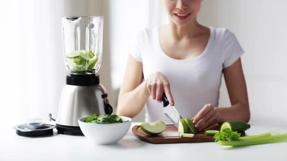 Smiling Woman With Blender Chopping Vegetables 2