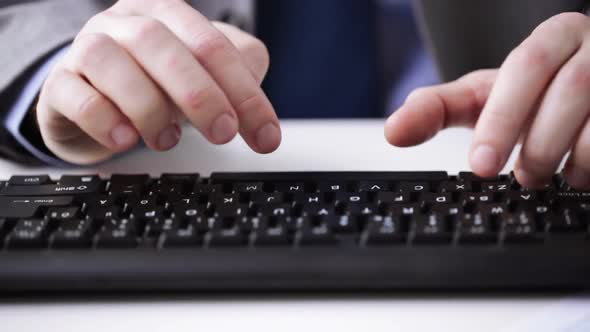 Close Up Of Businessman Hands Typing On Keyboard 26