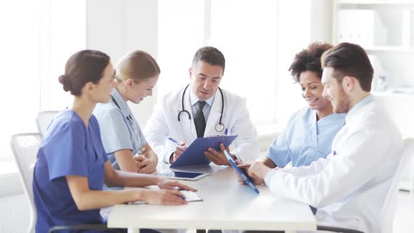 Group Of Doctors Meeting At Hospital Office 1 alt