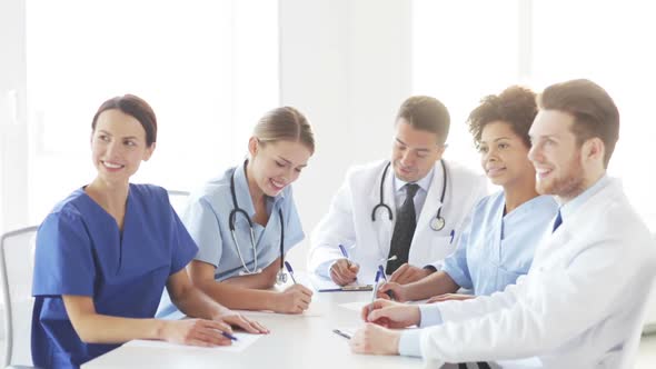 Group Of Doctors Meeting At Seminar In Hospital 3