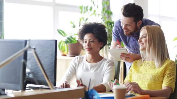 Happy Creative Team With Computers In Office 18