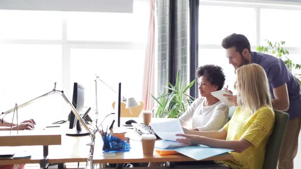 Happy Creative Team With Computers In Office 3