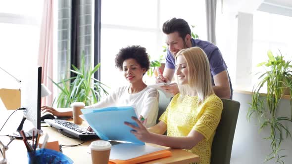 Happy Creative Team With Computers In Office 5