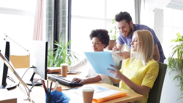 Happy Creative Team With Computers In Office 6