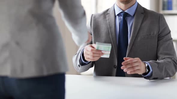 Close Up Of Businessman Taking Money Bribe 2